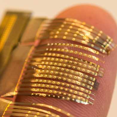 Golden robotic skin on a finger